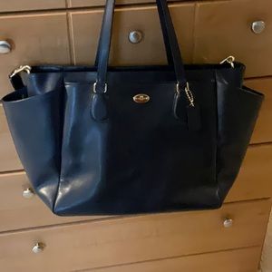 COACH: l cross grain leather navy baby bag